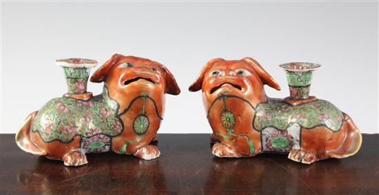 A pair of Chinese export enamelled porcelain Buddhist lion vases, mid 19th century, length 12.5cm